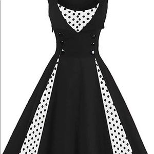 Black dress not true to size. Never been worn